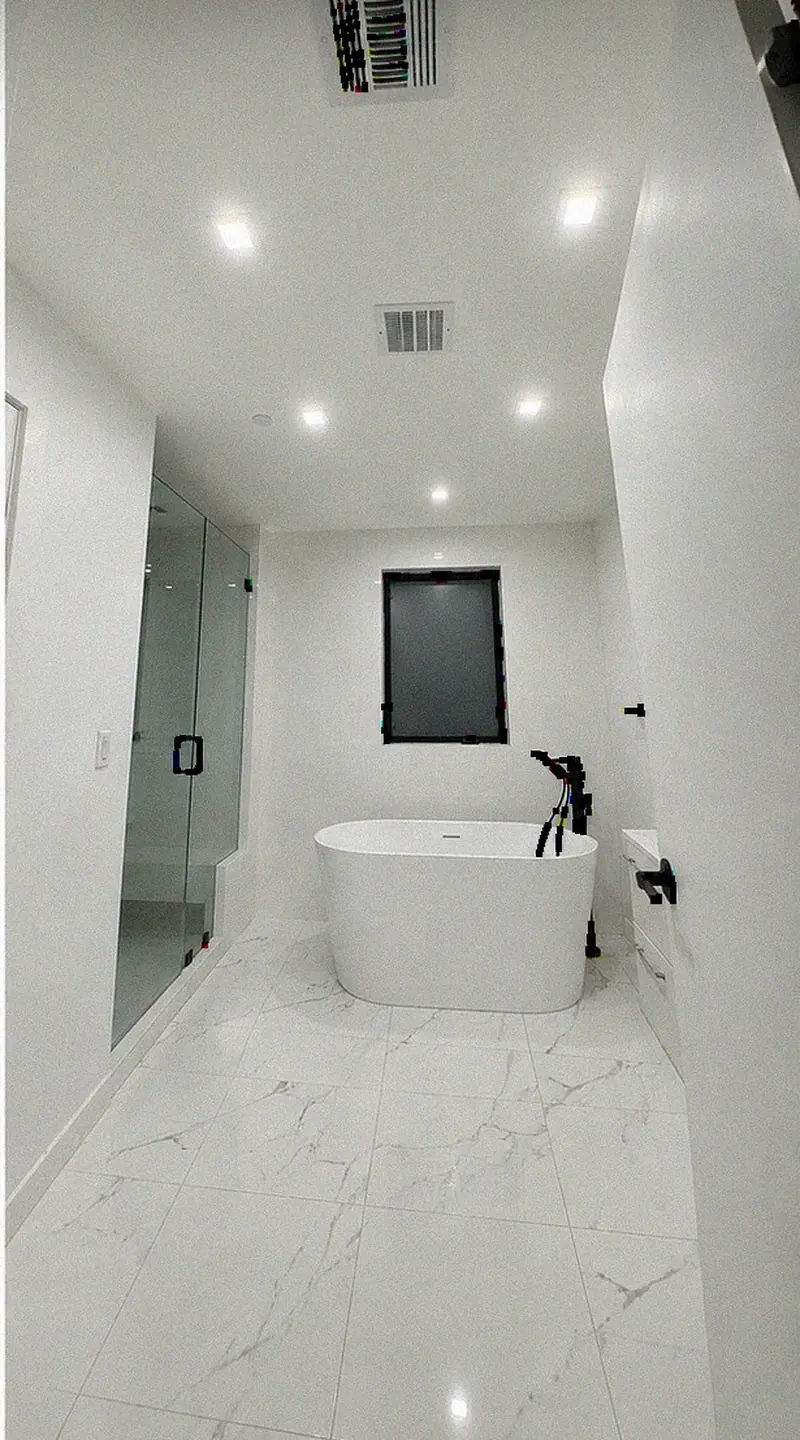 Narrow hall bathroom after remodel — YKCA Bay Area
