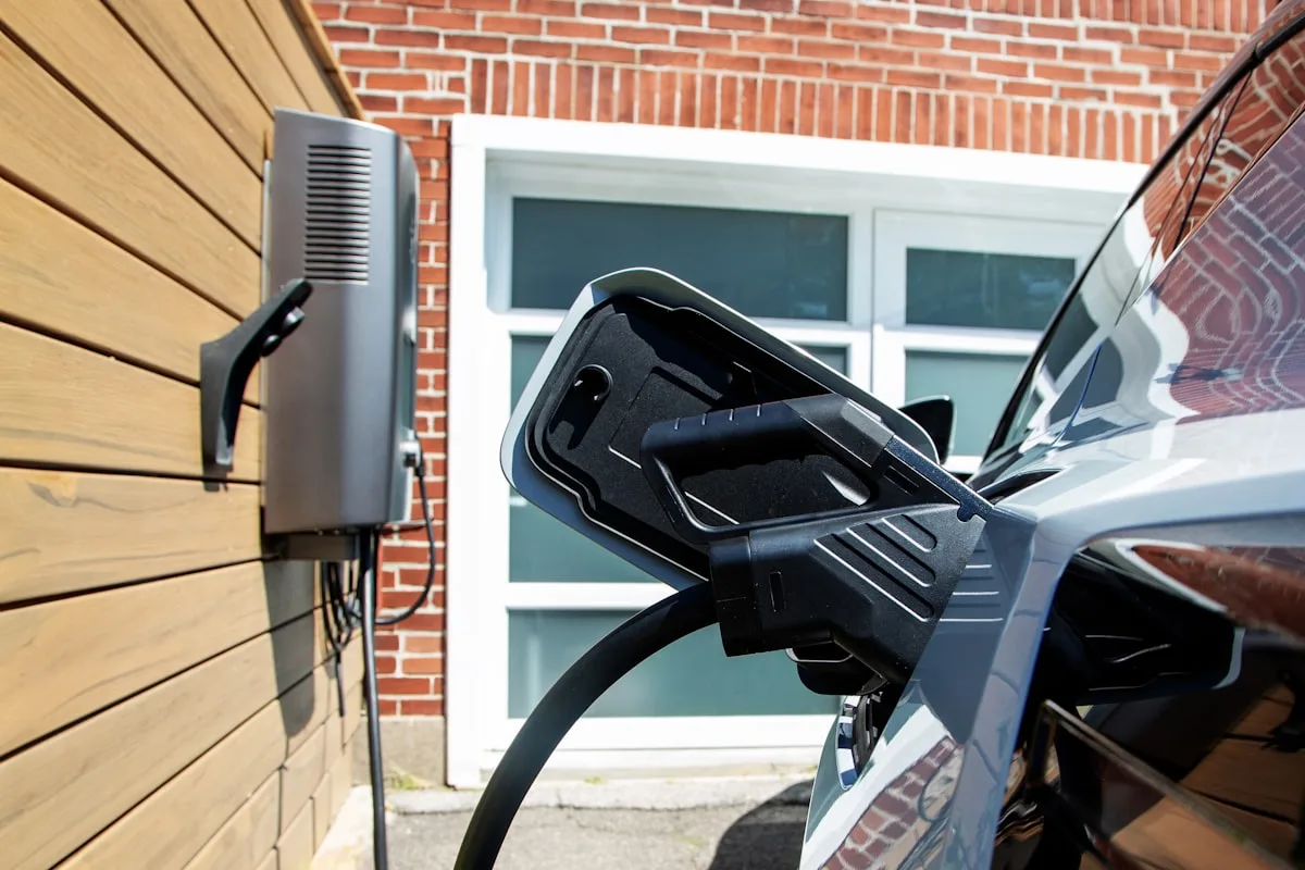 Residential Level 2 EV charger installation on home garage wall